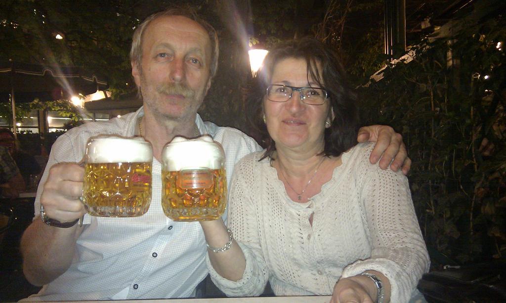 Luxury Family Hotel Royal Palace Prague Exterior photo A German couple drinking beer